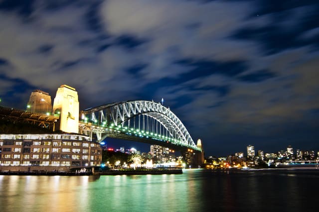 http://www.dreamstime.com/royalty-free-stock-image-moon-lit-sydney-harbour-bridge-moving-clouds-sky-image28729136